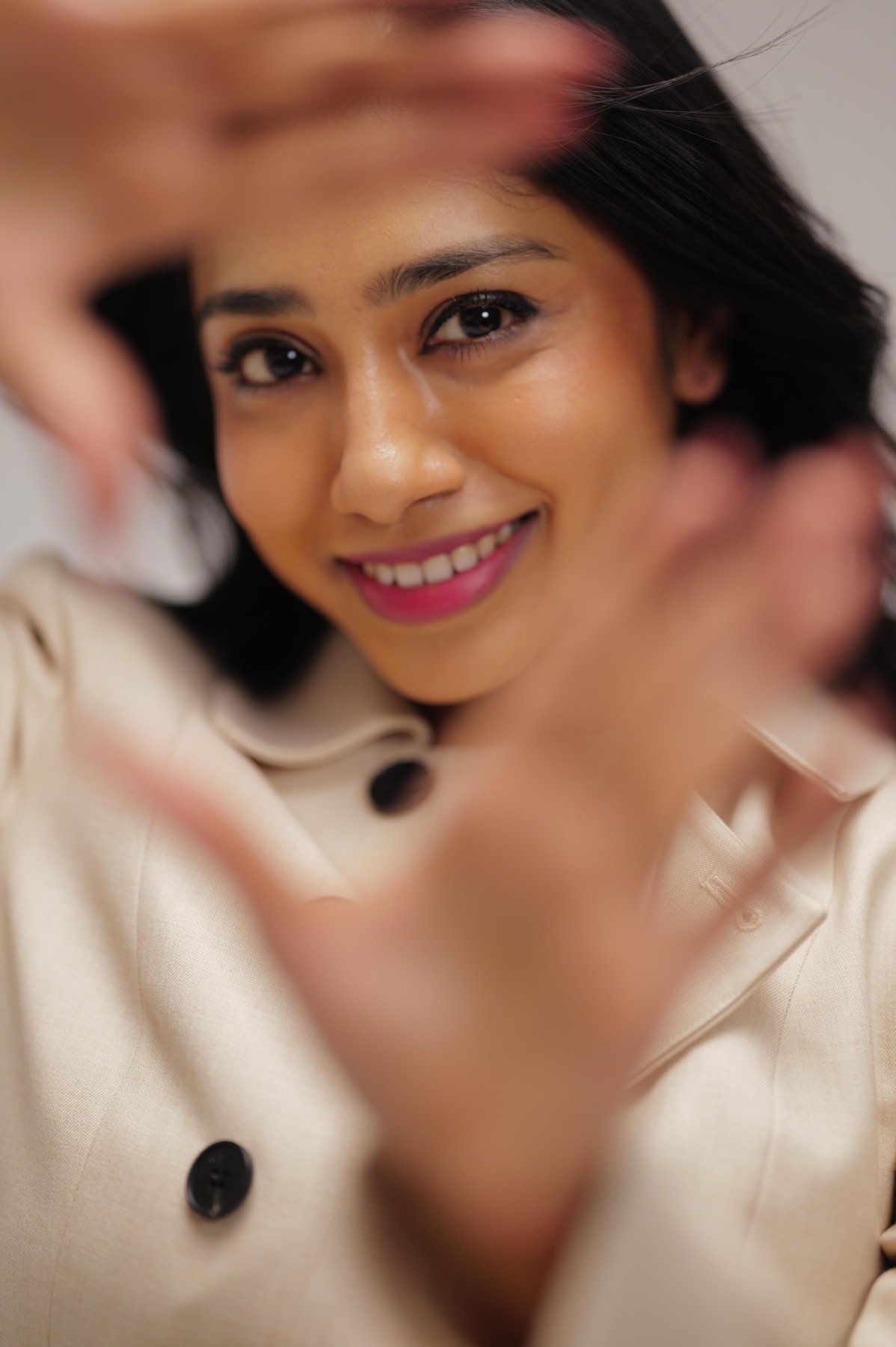 Ash Bala in a cream blazer
